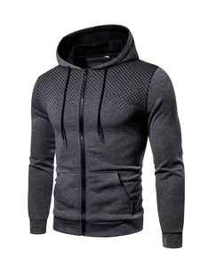 Detail of grey zip hoodie with black gradient dot pattern and textured cotton fabric
