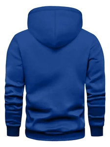 Macro detail of navy blue hoodie showing premium textured fabric and ribbed cuffs
