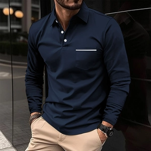 Detail of navy long sleeve polo shirt with chest pocket and white contrast stripe trim