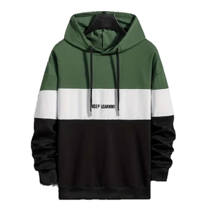 Three-color block hoodie with Keep Learning print, featuring green, white and black panels