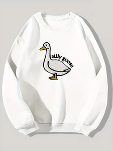 Détail des poignets côtelés et du mélange de coton doux du sweat-shirt blanc à motif d'oie