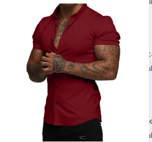 Close-up of a slim-fit burgundy short-sleeve shirt featuring contrasting black buttons