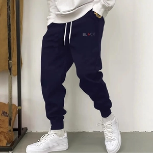Men's navy blue casual jogger pants with white drawstring and BLACK print detail