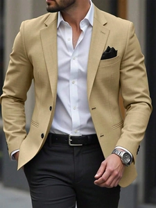 Detail of slim fit beige blazer with notched lapels and black pocket square for men