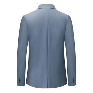 Rear view of slim fit blue blazer featuring center seam and decorative cuff buttons