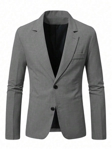 Detail view of notch lapels and two-button closure on a grey slim fit blazer