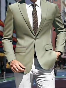 Detail of slim fit sage green single button blazer with subtle woven texture on fabric