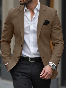 Detail of tan slim fit blazer with two buttons, notched lapel and texture