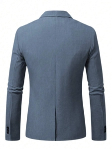 Detail view of the slim-fit grey-blue blazer back featuring single vent and twill fabric texture