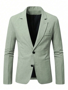Macro view of sage green blazer showing fine fabric texture and notched lapel