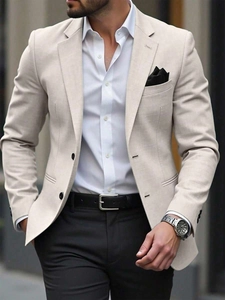 Detail of slim fit beige blazer with two-button closure and textured fabric for men