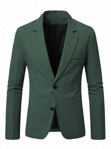 Detailed shot of dark green slim-fit blazer showing notch lapels and two-button closure