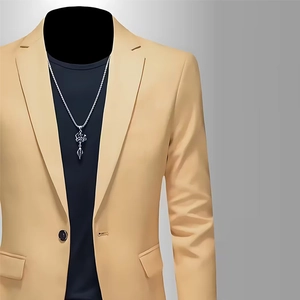 Close-up of khaki slim fit blazer with single button and stylish silver necklace