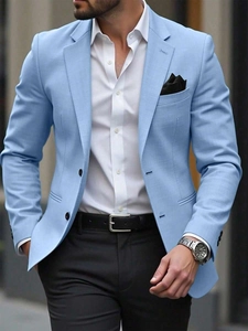 Detailed close-up of light blue slim fit blazer featuring notch lapels and pocket square