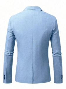 Rear view detail of light blue slim fit blazer showing back slit and textured fabric