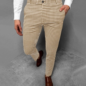 Men's slim fit plaid trousers in brown gingham pattern with professional business casual style