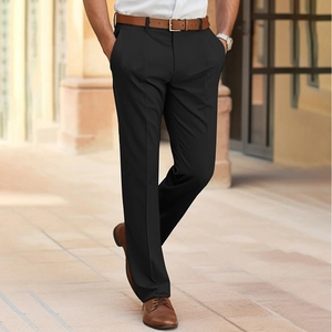 Detail of men's black business trousers featuring a sharp crease and straight-leg tailoring