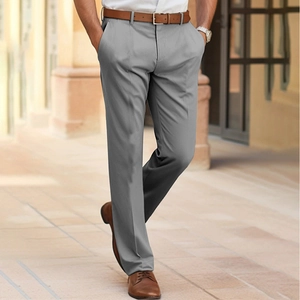 Close-up of men's slim fit grey plaid trousers with brown leather belt and dress shoes