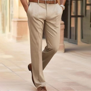 Close-up of khaki plaid dress pants for men with sharp creases and brown leather belt