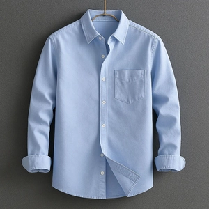 Classic light blue long sleeve business shirt with chest pocket and button-down collar