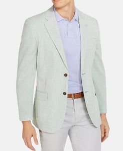 Detail of green seersucker fabric on a men's slim fit single-breasted striped blazer jacket