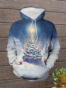 Détail de l'imprimé sapin de Noël et de la poche kangourou sur sweat à capuche bleu