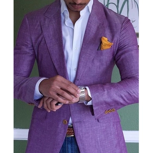 Detail of lavender linen blazer with notched lapel and textured fabric finish
