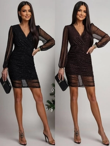 Detail of elegant V-neck mesh sleeve dress featuring ruched sequins and sparkly finish