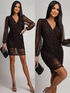 Detail of elegant V-neck ruched dress with sheer mesh sleeves and silver glitter sequins