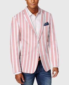 Detail of pink and white striped blazer with notch lapel and blue polka dot pocket square