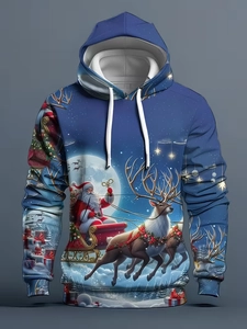Détail du sweat à capuche de Noël montrant l'impression 3D du Père Noël au-dessus de la poche