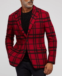 Detailed close-up of a red and black tartan plaid wool blazer with classic notched lapels