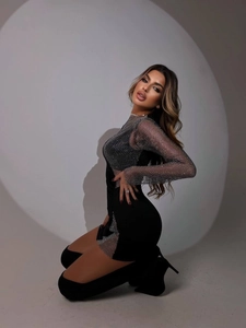 Chic black mini dress with mesh patchwork and rhinestones for a sexy slim fit