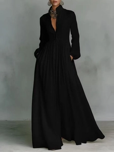 Robe longue noire élégante à manches longues, col en V, taille haute et jupe plissée