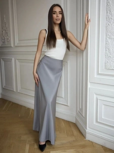 Elegant high-waisted gray satin fishtail maxi skirt with a graceful draped silhouette