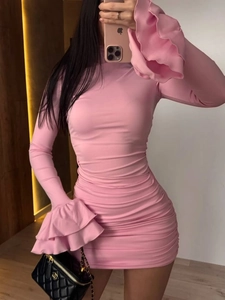 Detailed view of the double-layered ruffle cuffs on this pink bodycon high-neck dress