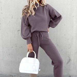 Detail of lavender fleece loungewear set featuring ribbed cuffs and drawstring waist