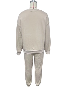 Rear view of beige fleece tracksuit with ribbed cuffs and drop shoulder sweatshirt