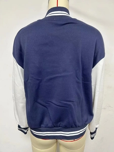 Back view of navy and white varsity jacket showing striped ribbed collar and hem detail