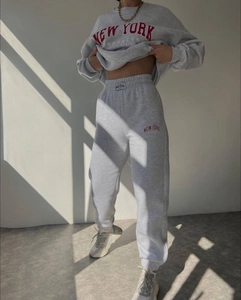 Detail of light grey New York print sweatshirt and sweatpants set with elastic waistband