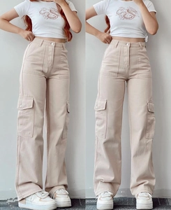 Detailed view of functional flap cargo pockets on beige high-waist straight pants