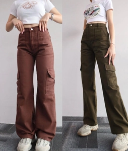Detail of high-waisted cargo pants with side flap pockets in brown and army green