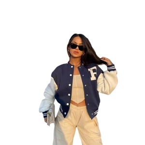 Navy blue and white varsity jacket with letter F patch and striped ribbed trims