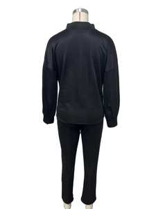 Rear view of black long-sleeve tracksuit with high neck and soft fleece material
