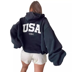 Women's black oversized hoodie featuring USA 1984 print on the back with dropped shoulders