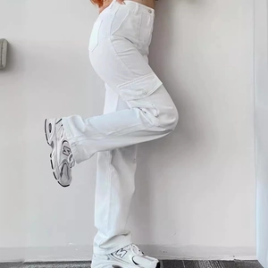 Women's white high-waisted cargo pants with side flap pockets in minimalist casual style