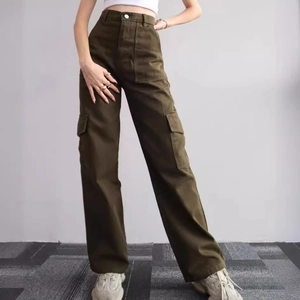 Army green cargo pants with high waist and large utility side pockets in a loose fit