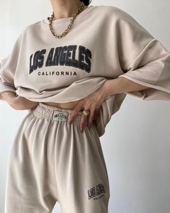 Detail view of beige casual two-piece set with Los Angeles California graphic print