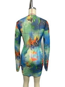 Close-up of Y2K long sleeve mini dress featuring colorful watercolor butterfly prints