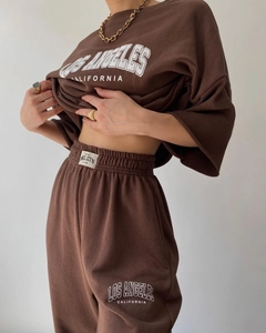 Detail of Los Angeles print on brown short sleeve sweatshirt and joggers set